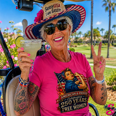 Sassy retired lady in golf cart wearing patriotic freedom t-shirt